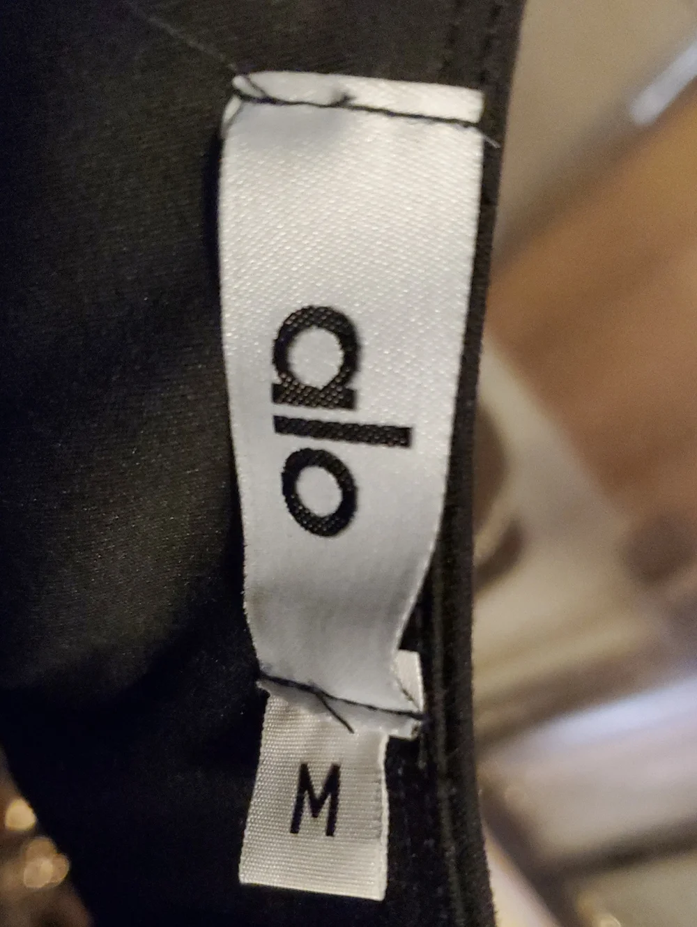 ALO Yoga Black Sports Bra with White Piping